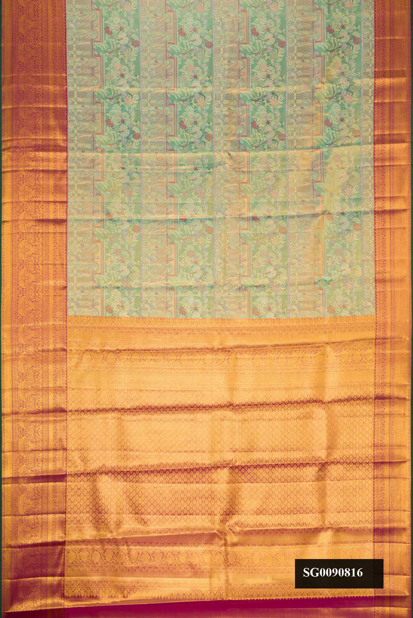 Pista Green Dual Tone Kanchipuram Tissue Silk Saree with Zari Brocade on the body and Zari Border.  displayed on a mannequin