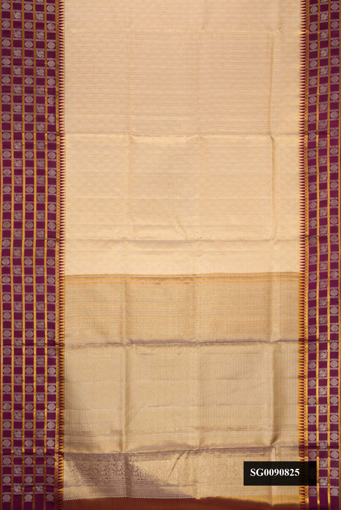 Gold Dual Tone Kanchipuram Tissue Silk Saree with Zari Brocade on the body and Fancy Border.  displayed on a mannequin
