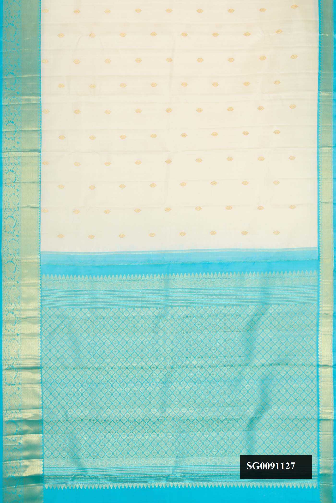 Off White Dual Tone Kanchipuram Silk Saree with Zari Butta on the body and Zari Border.  displayed on a mannequin
