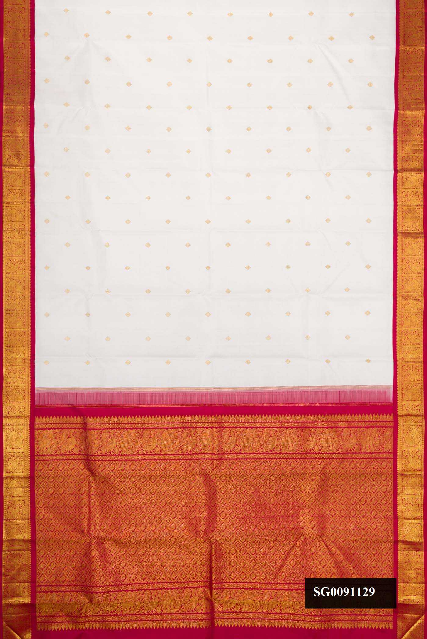 White Dual Tone Kanchipuram Silk Saree with Zari Butta on the body and Zari Border.  displayed on a mannequin