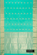 Sea Green Dual Tone Kanchipuram Silk Saree with Zari Butta on the body and Zari Border.  displayed on a mannequin