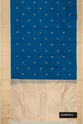 Peacock Blue Dual Tone Kanchipuram Silk Saree with Zari Butta on the body and Zari Border.  displayed on a mannequin