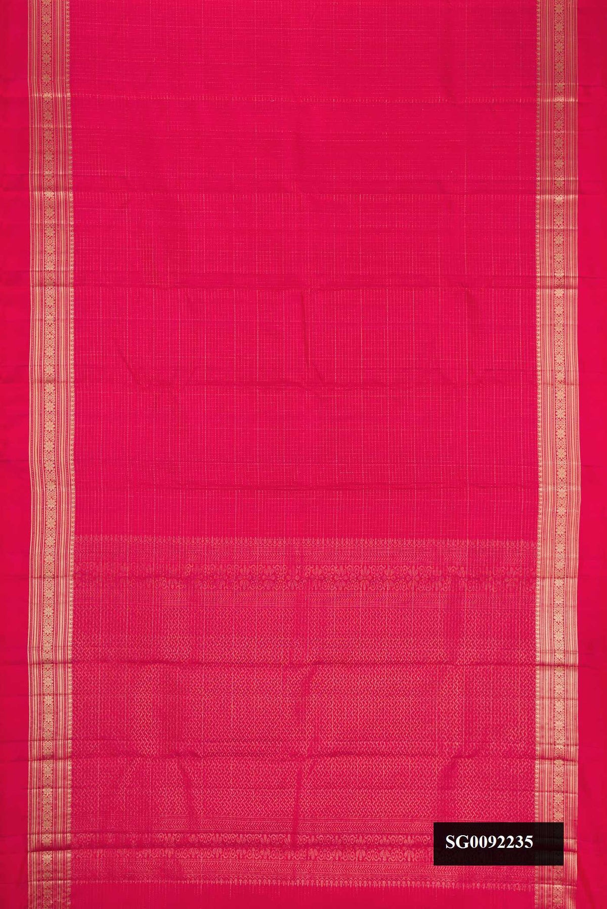 Dark Pink Dual Tone Kanchipuram Silk Saree with Checked design on the body and Zari Border.  displayed on a mannequin