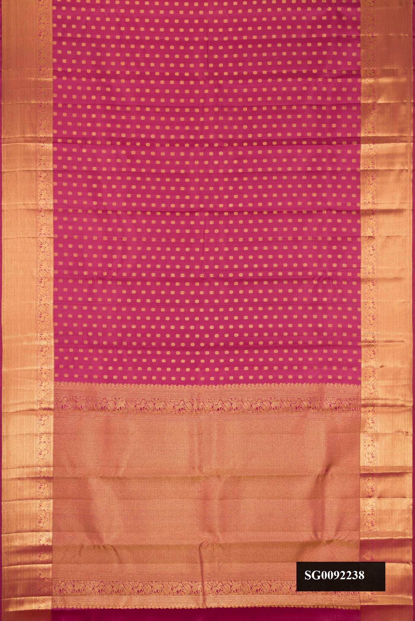 Dark Mauve Dual Tone Kanchipuram Silk Saree with Zari Butta on the body and Zari Border.  displayed on a mannequin