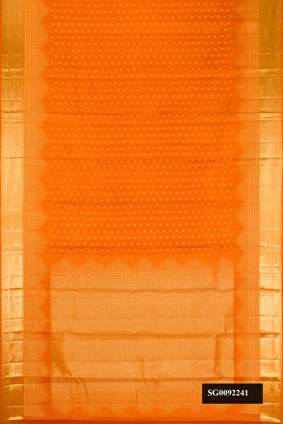 Orange Dual Tone Kanchipuram Silk Saree with Zari Butta on the body and Zari Border.  displayed on a mannequin