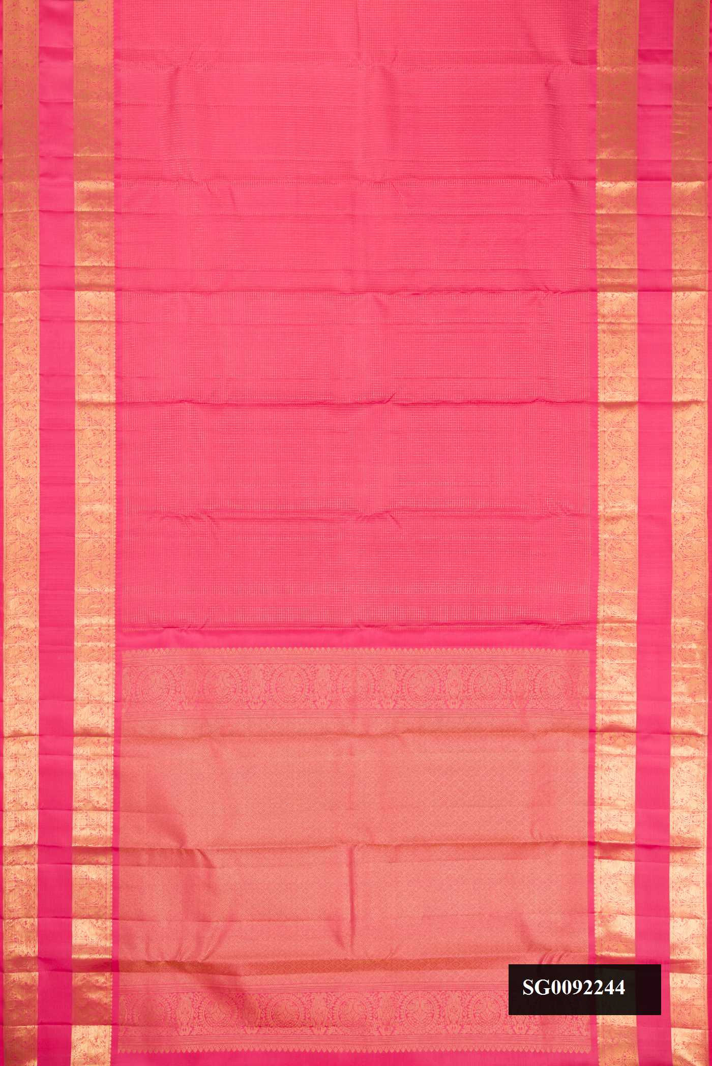Pink Dual Tone Kanchipuram Silk Saree with Checked design on the body and Zari Border.  displayed on a mannequin