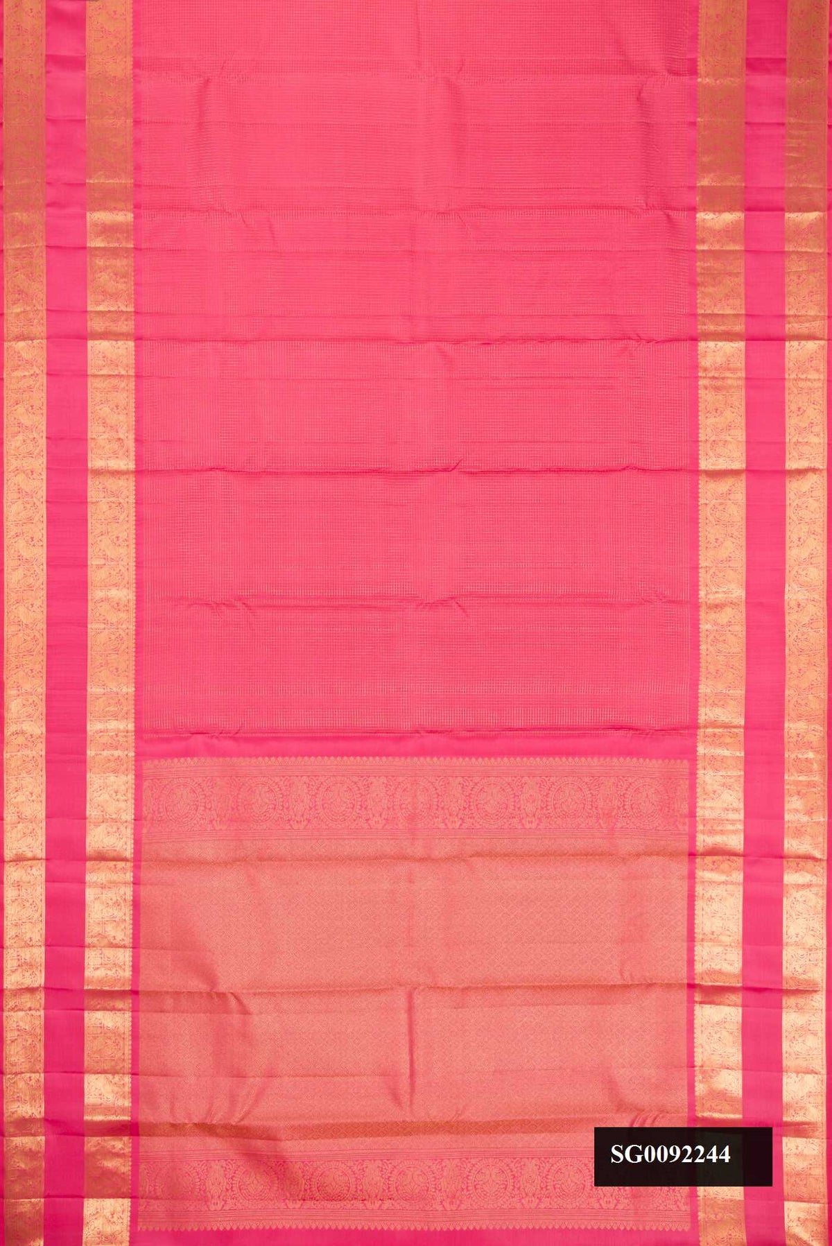 Pink Dual Tone Kanchipuram Silk Saree with Checked design on the body and Zari Border.  displayed on a mannequin