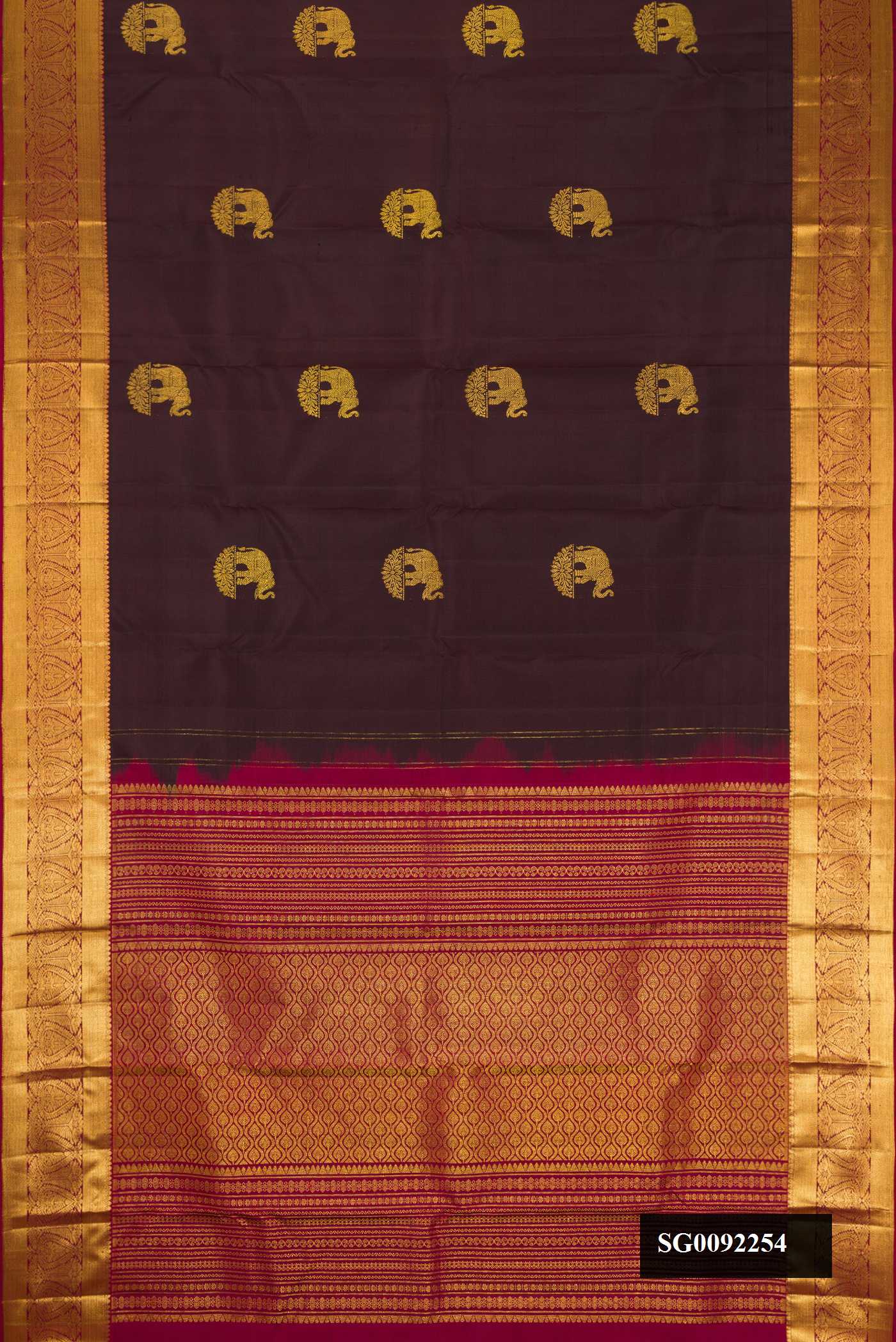 Coffee Brown Dual Tone Kanchipuram Silk Saree with Zari Butta on the body and Zari Border.  displayed on a mannequin