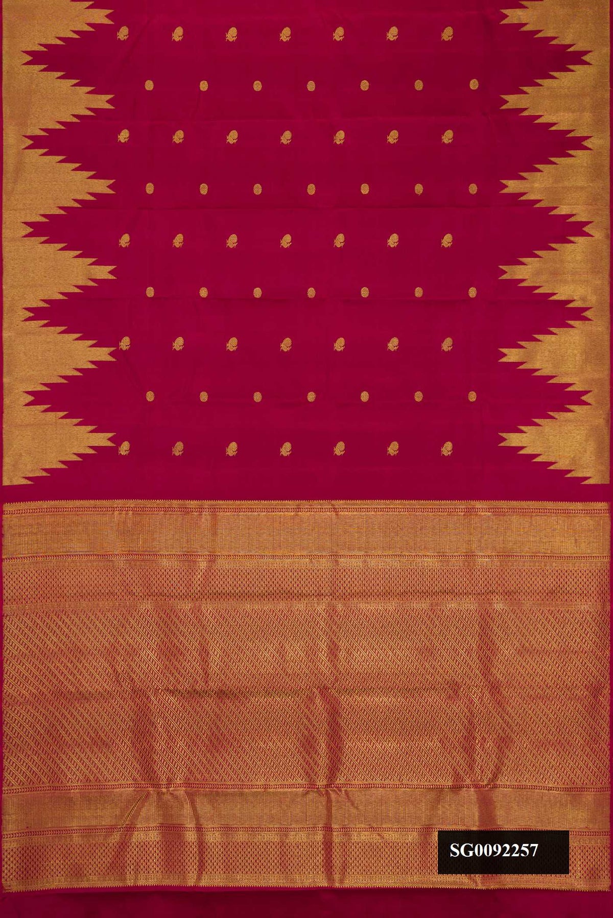 Maroon Dual Tone Kanchipuram Silk Saree with Zari Butta on the body and Temple Border.  displayed on a mannequin