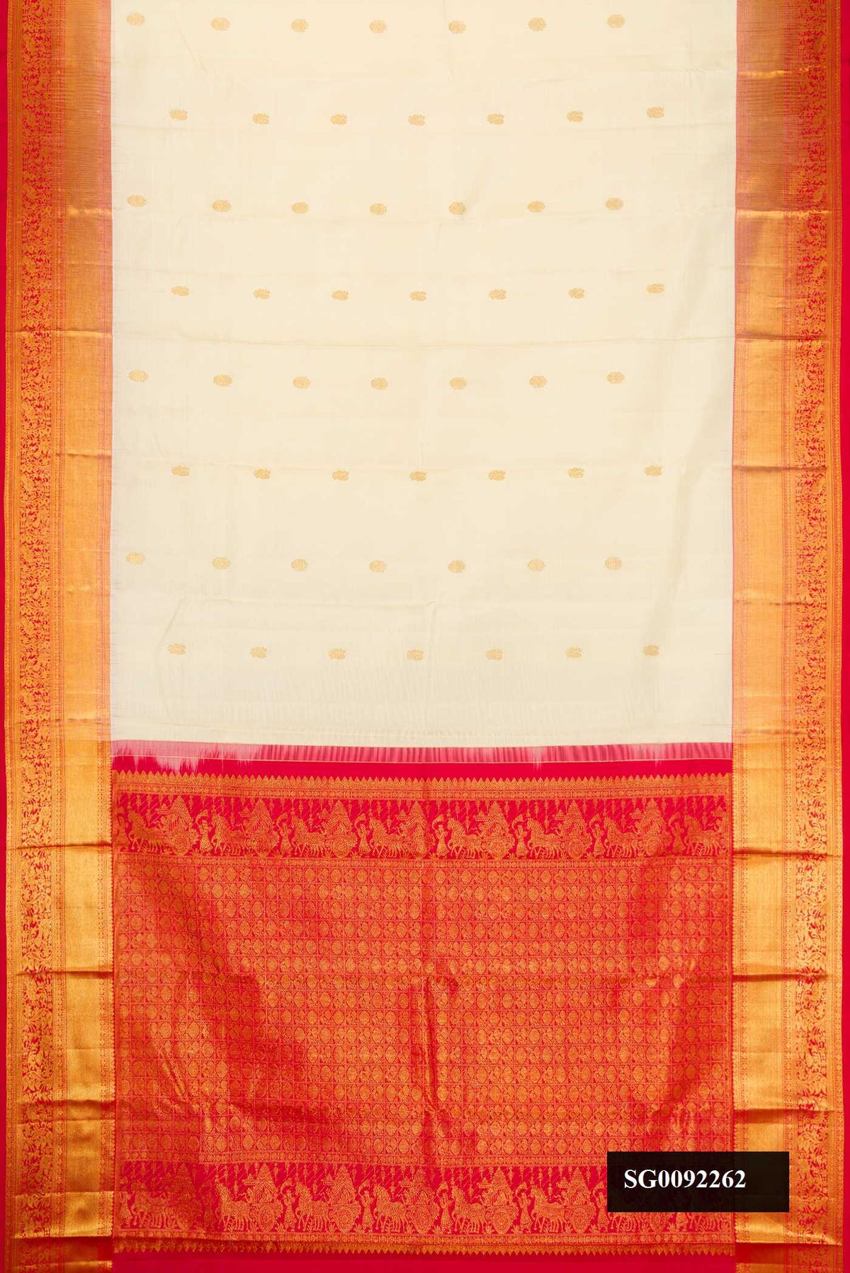 Off White Dual Tone Kanchipuram Silk Saree with Zari Butta on the body and Zari Border.  displayed on a mannequin