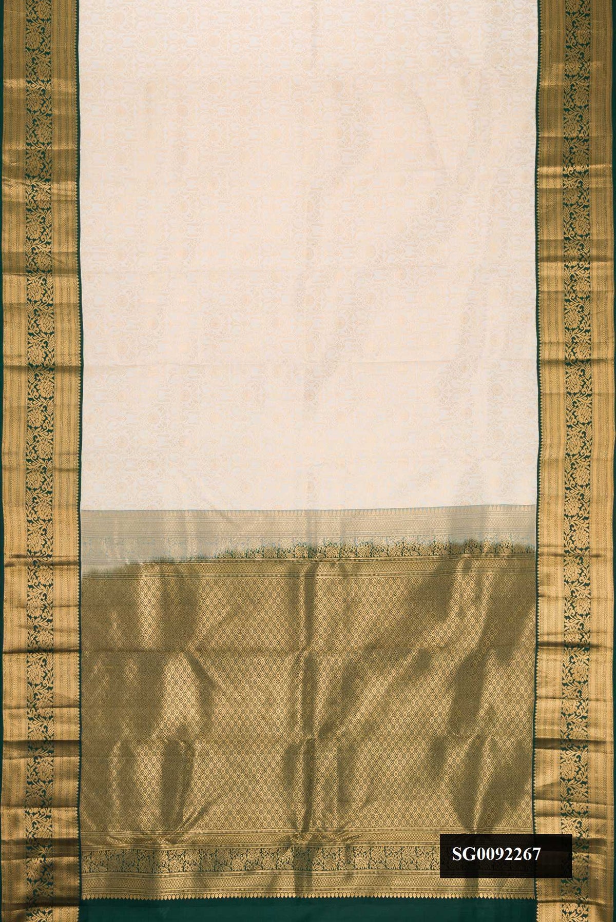Off White Dual Tone Kanchipuram Silk Saree with Zari Brocade on the body and Zari Border.  displayed on a mannequin