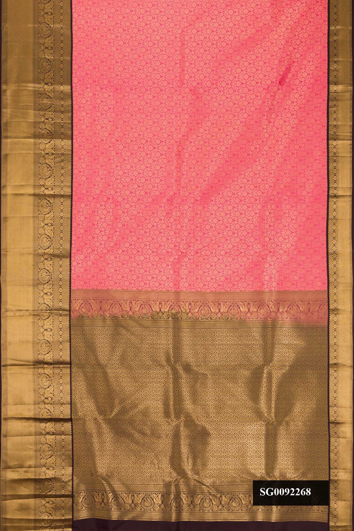 Pink Dual Tone Kanchipuram Silk Saree with Zari Brocade on the body and Zari Border.  displayed on a mannequin