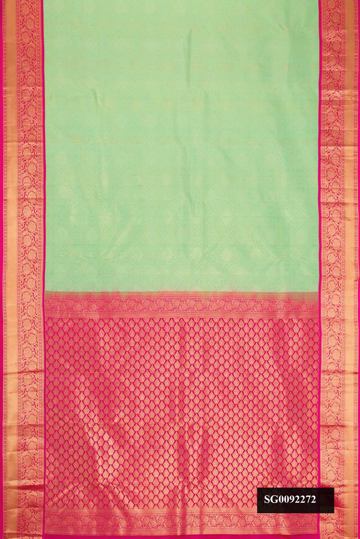 Pista Green Dual Tone Kanchipuram Silk Saree with Zari Brocade on the body and Zari Border.  displayed on a mannequin