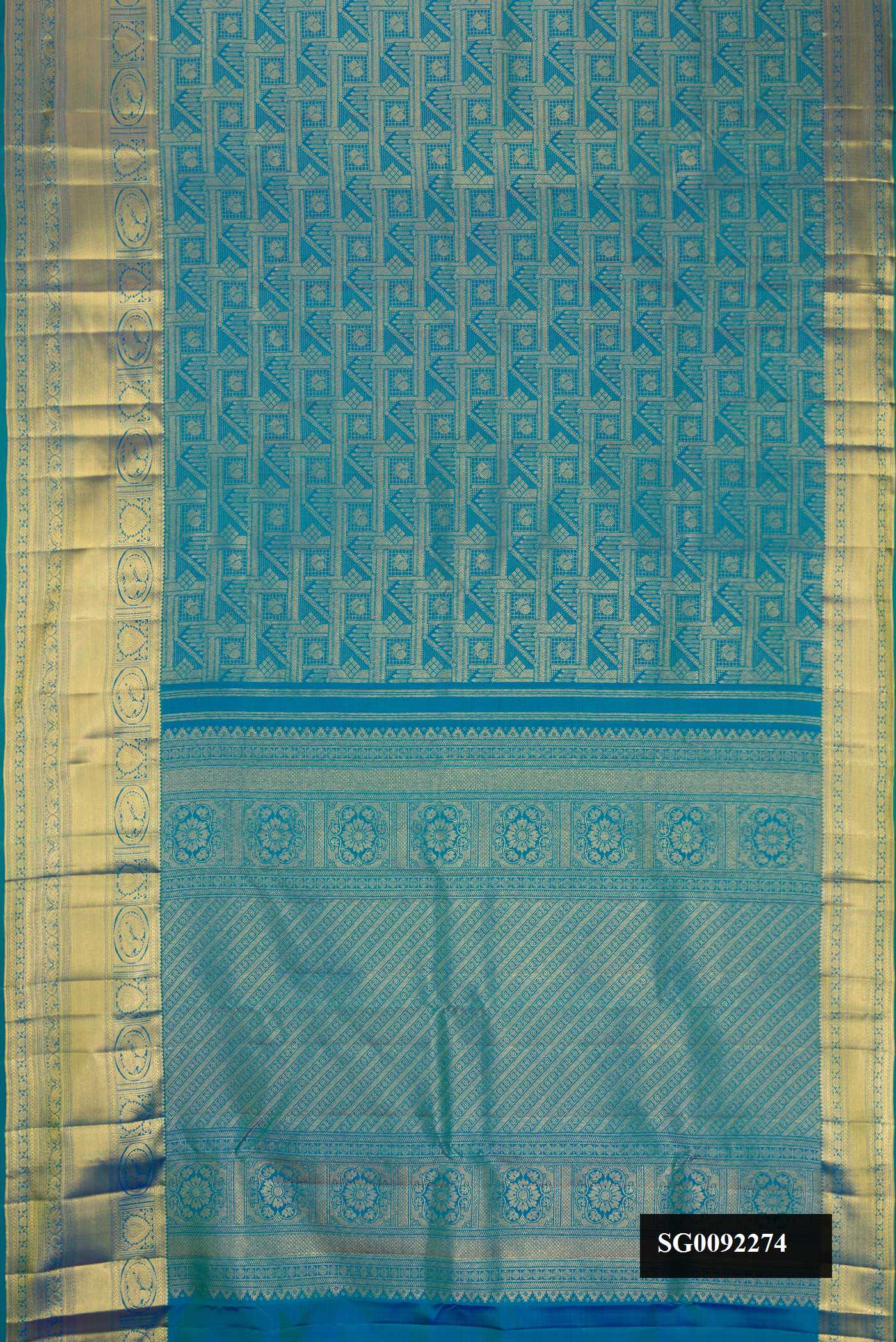 Peacock Blue Dual Tone Kanchipuram Silk Saree with Zari Brocade on the body and Zari Border.  displayed on a mannequin