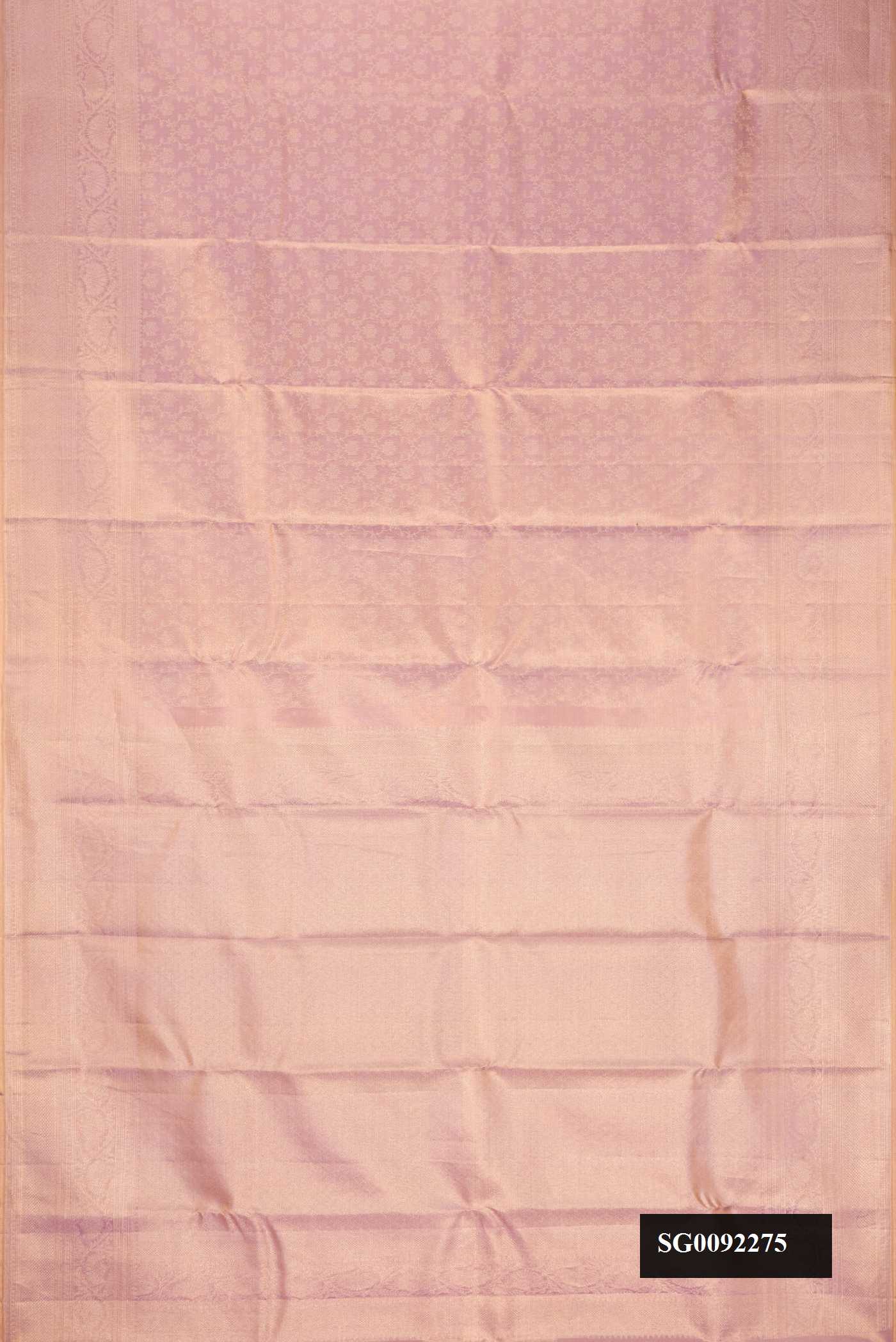 Rose pink Dual Tone Kanchipuram Tissue Silk Saree with Zari Brocade on the body and Zari Border.  displayed on a mannequin