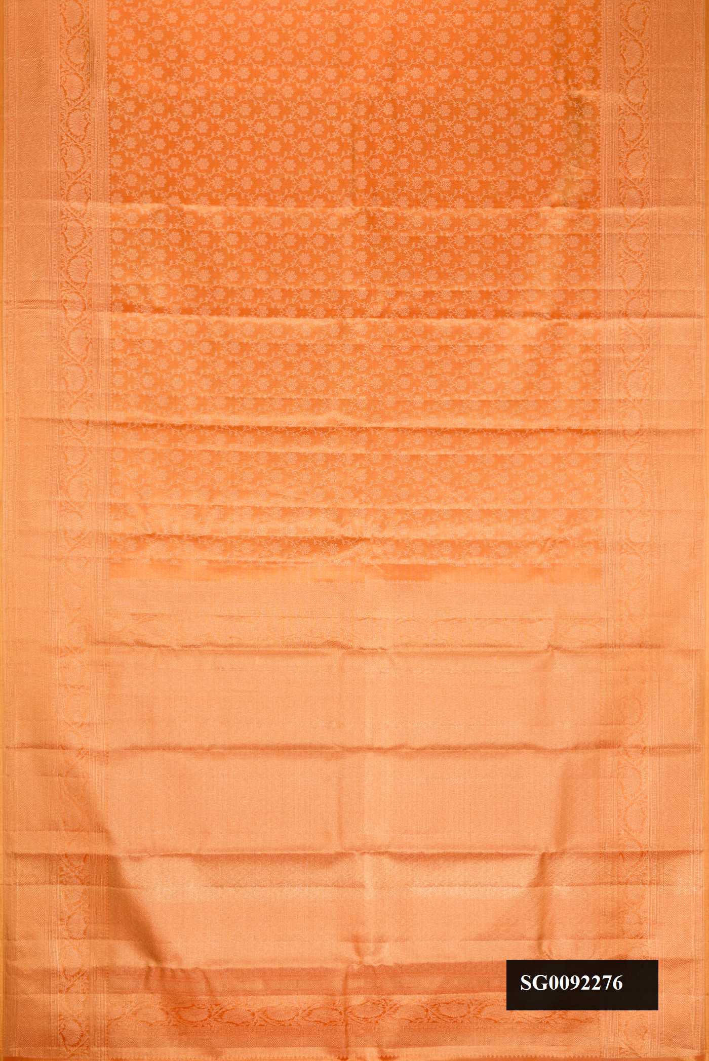 Orange Dual Tone Kanchipuram Tissue Silk Saree with Zari Brocade on the body and Zari Border.  displayed on a mannequin