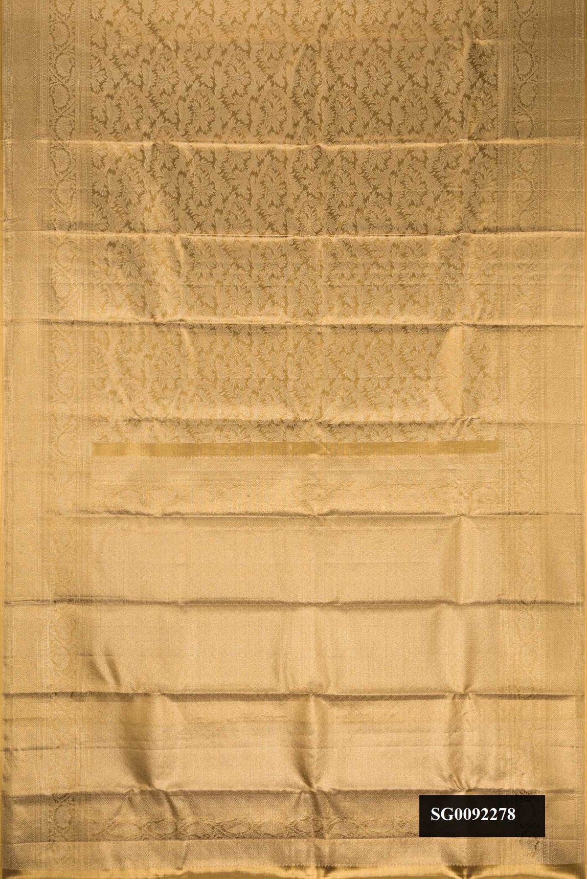 Gold Dual Tone Kanchipuram Tissue Silk Saree with Zari Brocade on the body and Zari Border.  displayed on a mannequin