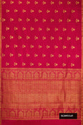 Maroon Dual Tone Kanchipuram Silk Saree with Zari Butta on the body and Zari Border.  displayed on a mannequin