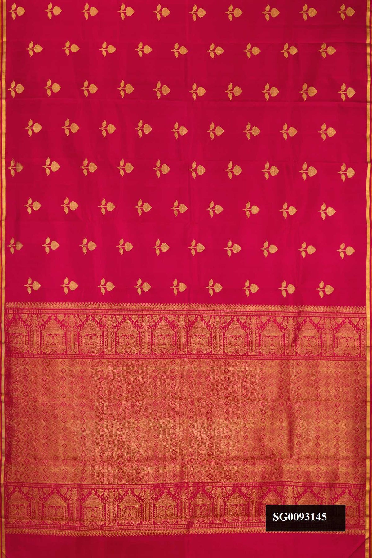 Maroon Dual Tone Kanchipuram Silk Saree with Zari Butta on the body and Zari Border.  displayed on a mannequin