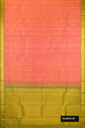 Peach Dual Tone Kanchipuram Silk Saree with Zari Butta on the body and Zari Border.  displayed on a mannequin