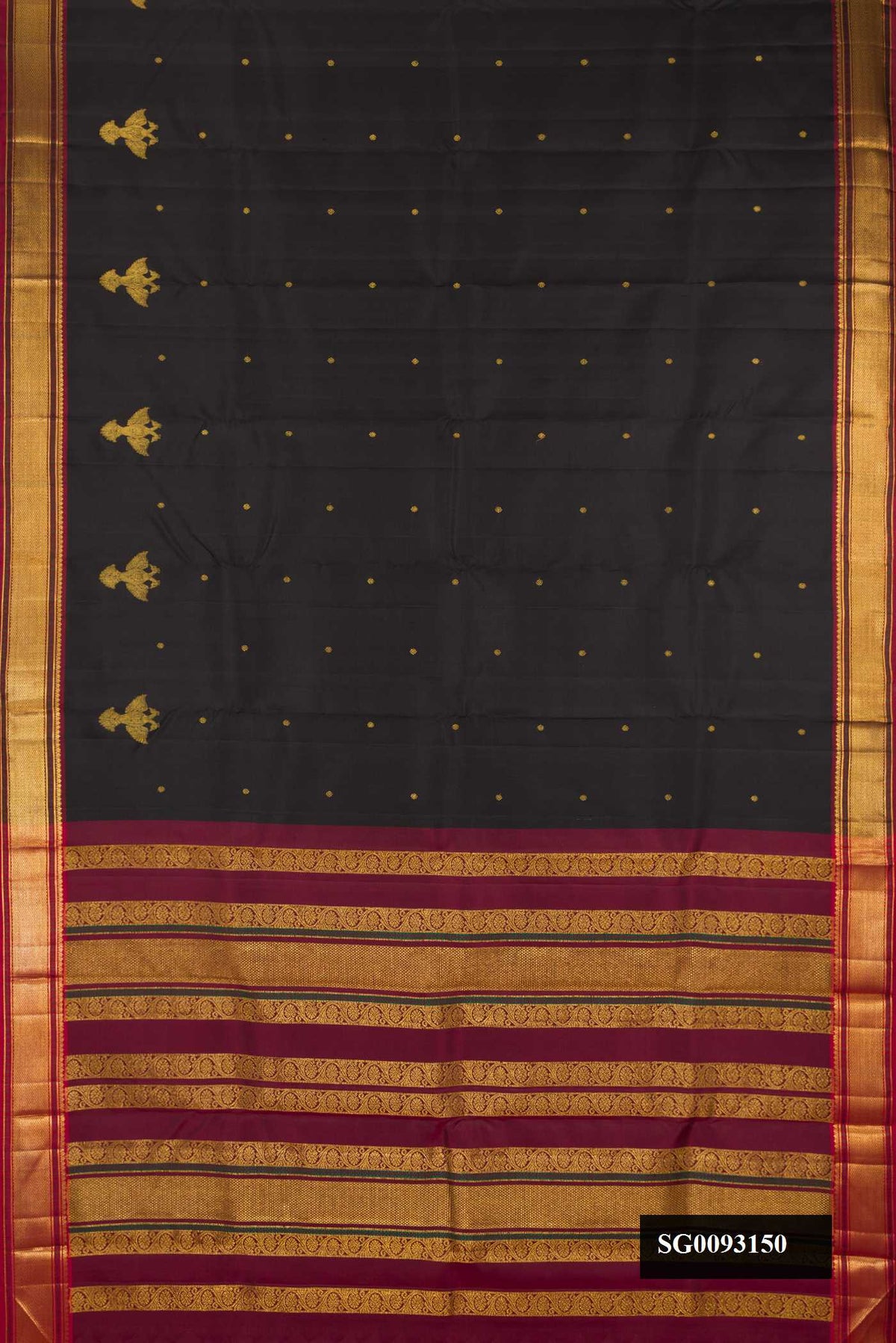 Black Dual Tone Kanchipuram Silk Saree with Zari Butta on the body and Zari And Thread Border.  displayed on a mannequin