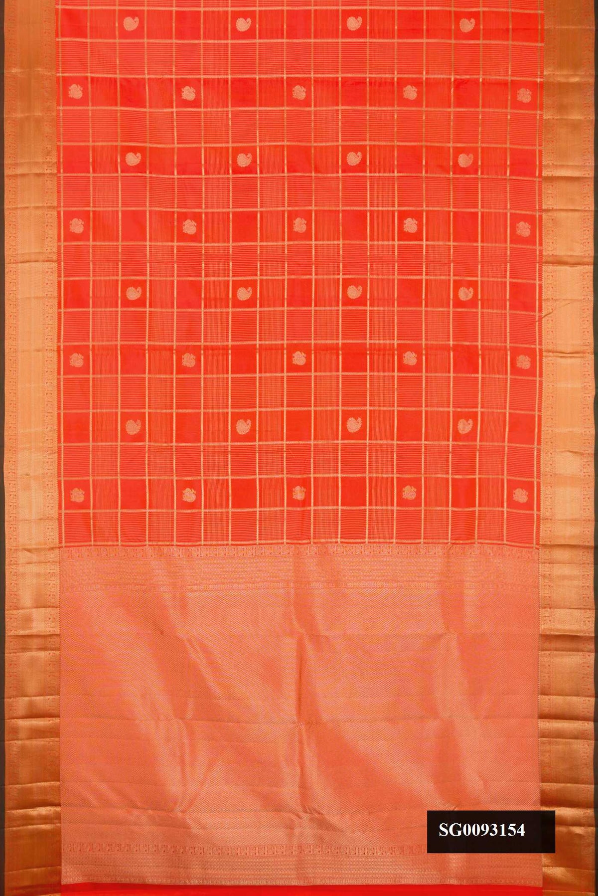 Orange Dual Tone Kanchipuram Silk Saree with Checked design on the body and Zari Border.  displayed on a mannequin