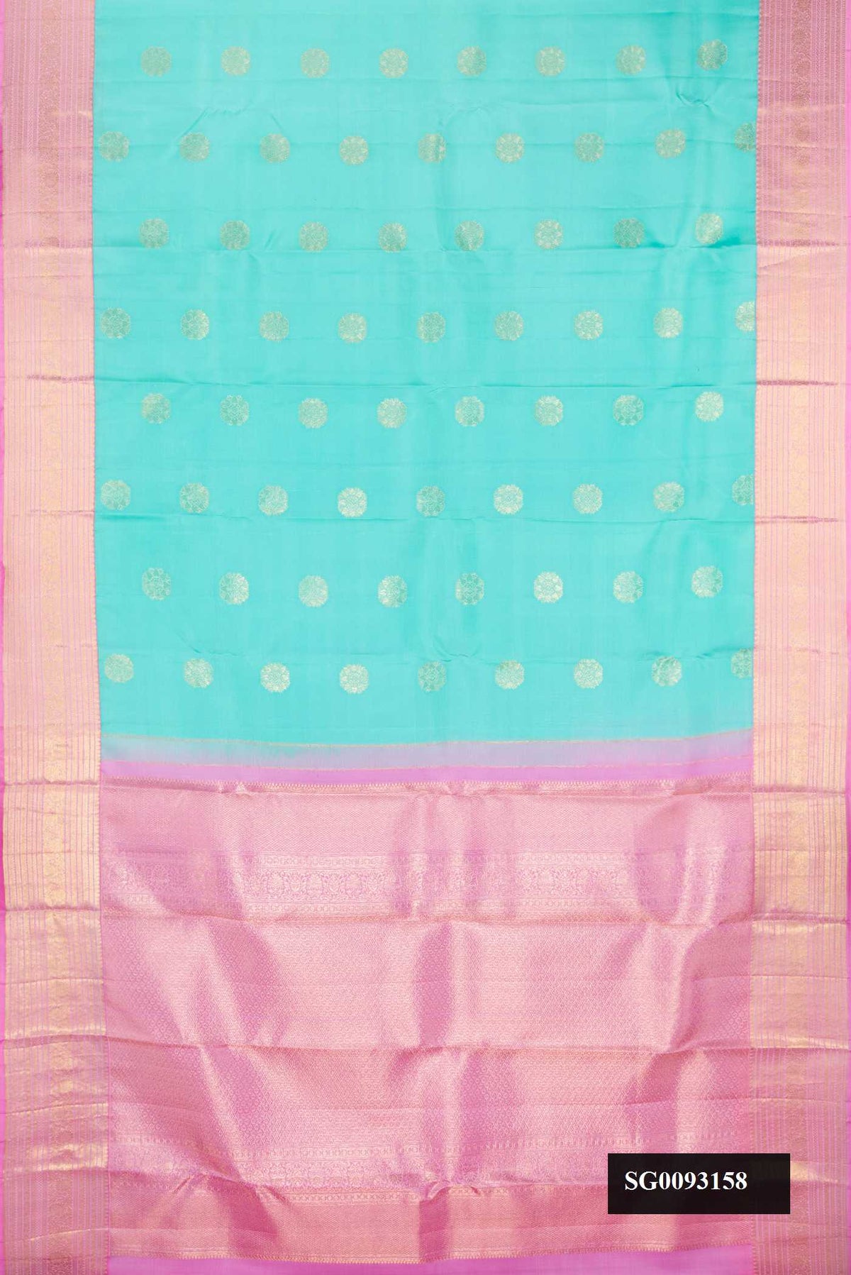 Sky Blue Dual Tone Kanchipuram Silk Saree with Zari Butta on the body and Zari Border.  displayed on a mannequin