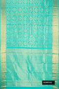 Sea Green Dual Tone Kanchipuram Silk Saree with Zari Brocade on the body and Zari Border.  displayed on a mannequin