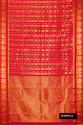 Red Dual Tone Kanchipuram Silk Saree with Checked design on the body and Zari Border.  displayed on a mannequin