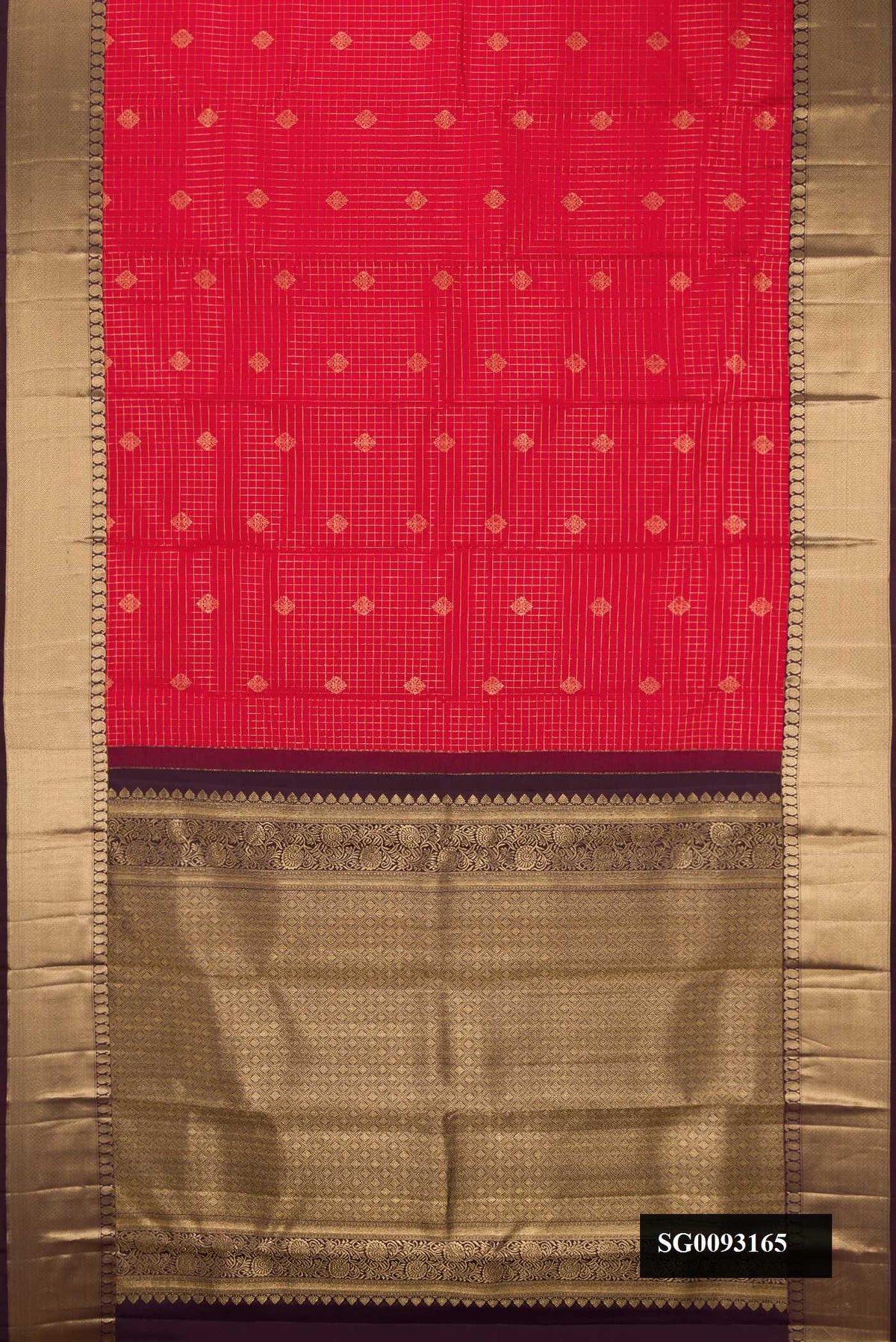 Red Dual Tone Kanchipuram Silk Saree with Checked design on the body and Zari Border.  displayed on a mannequin