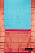 Sky Blue Dual Tone Kanchipuram Silk Saree with Checked design on the body and Zari Border.  displayed on a mannequin