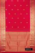 Dark Pink Dual Tone Kanchipuram Silk Saree with Zari Butta on the body and Zari Border.  displayed on a mannequin