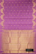 Lavender Dual Tone Kanchipuram Silk Saree with Zari Butta on the body and Fancy Border.  displayed on a mannequin