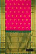 Dark Pink Dual Tone Kanchipuram Silk Saree with Zari Butta on the body and Zari Border.  displayed on a mannequin