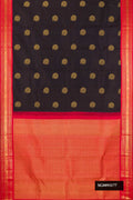 Black Dual Tone Kanchipuram Silk Saree with Zari Butta on the body and Zari Border.  displayed on a mannequin