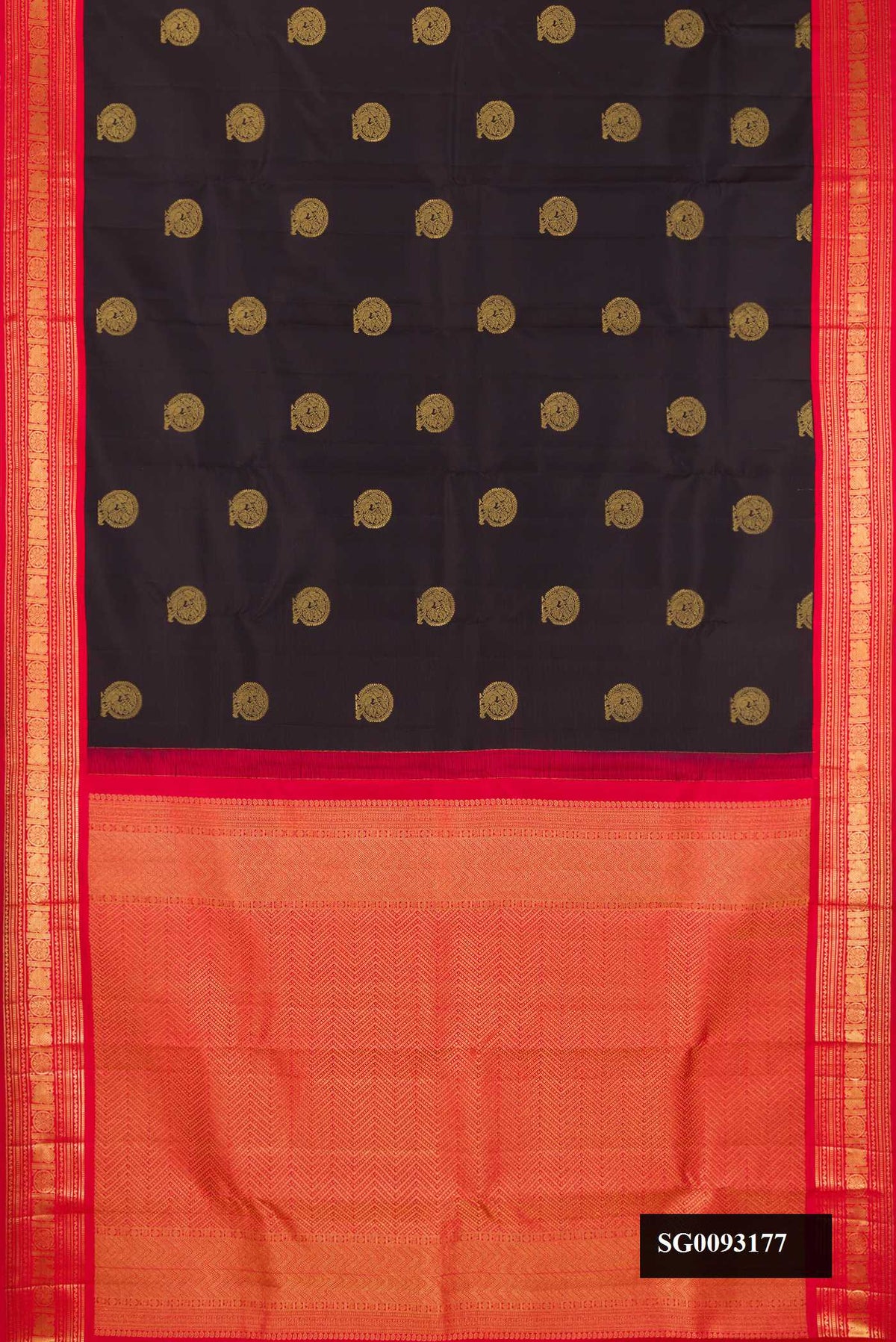 Black Dual Tone Kanchipuram Silk Saree with Zari Butta on the body and Zari Border.  displayed on a mannequin
