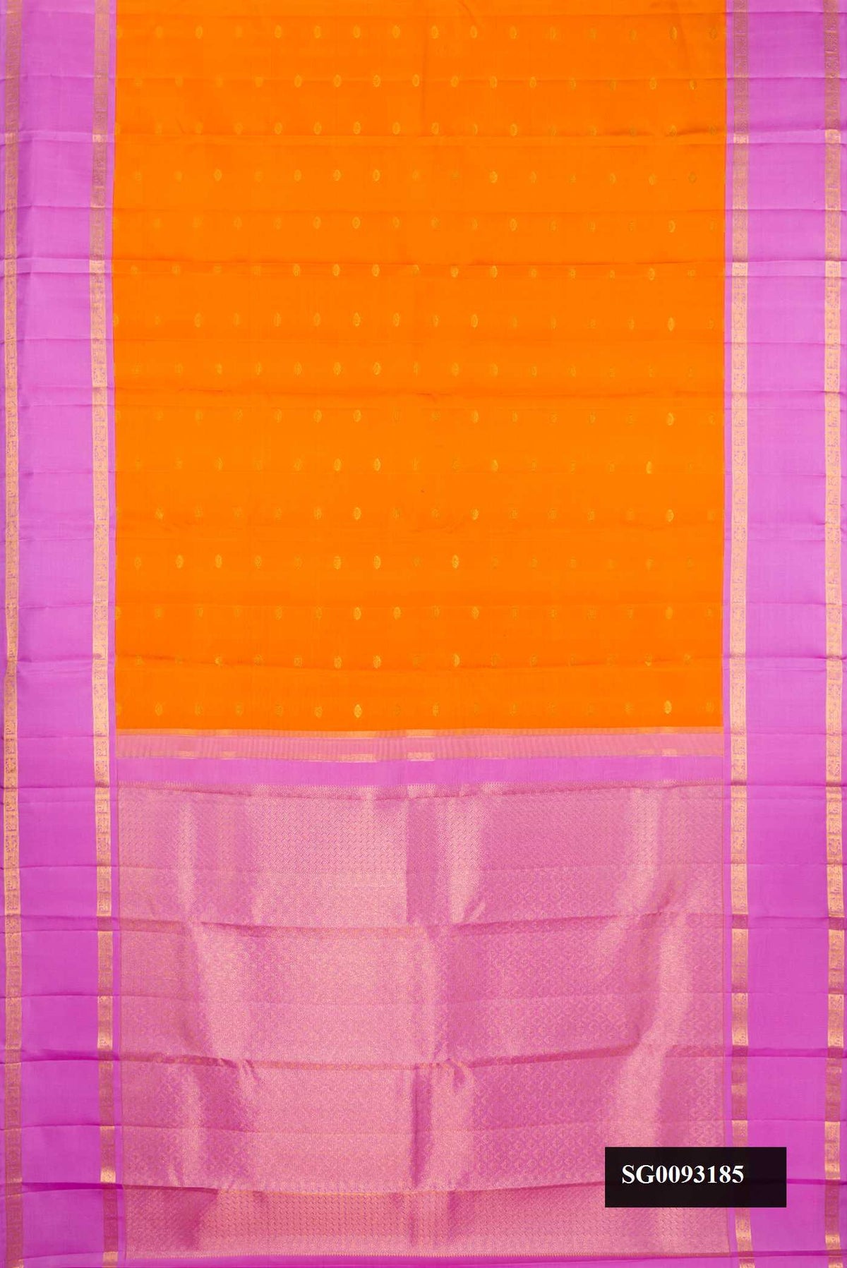 Mustard Dual Tone Kanchipuram Silk Saree with Zari Butta on the body and Zari Border.  displayed on a mannequin