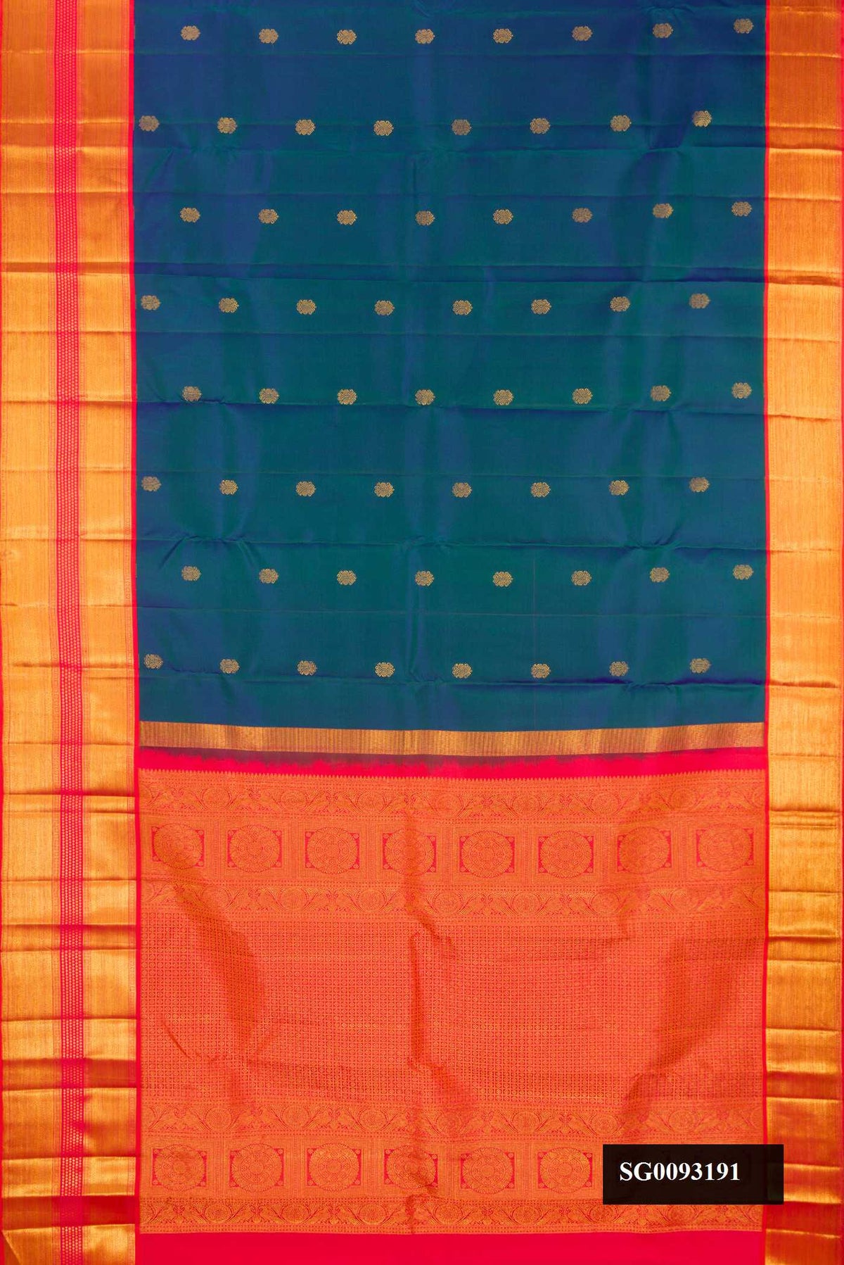 Peacock Blue Dual Tone Kanchipuram Silk Saree with Zari Butta on the body and Zari Border.  displayed on a mannequin
