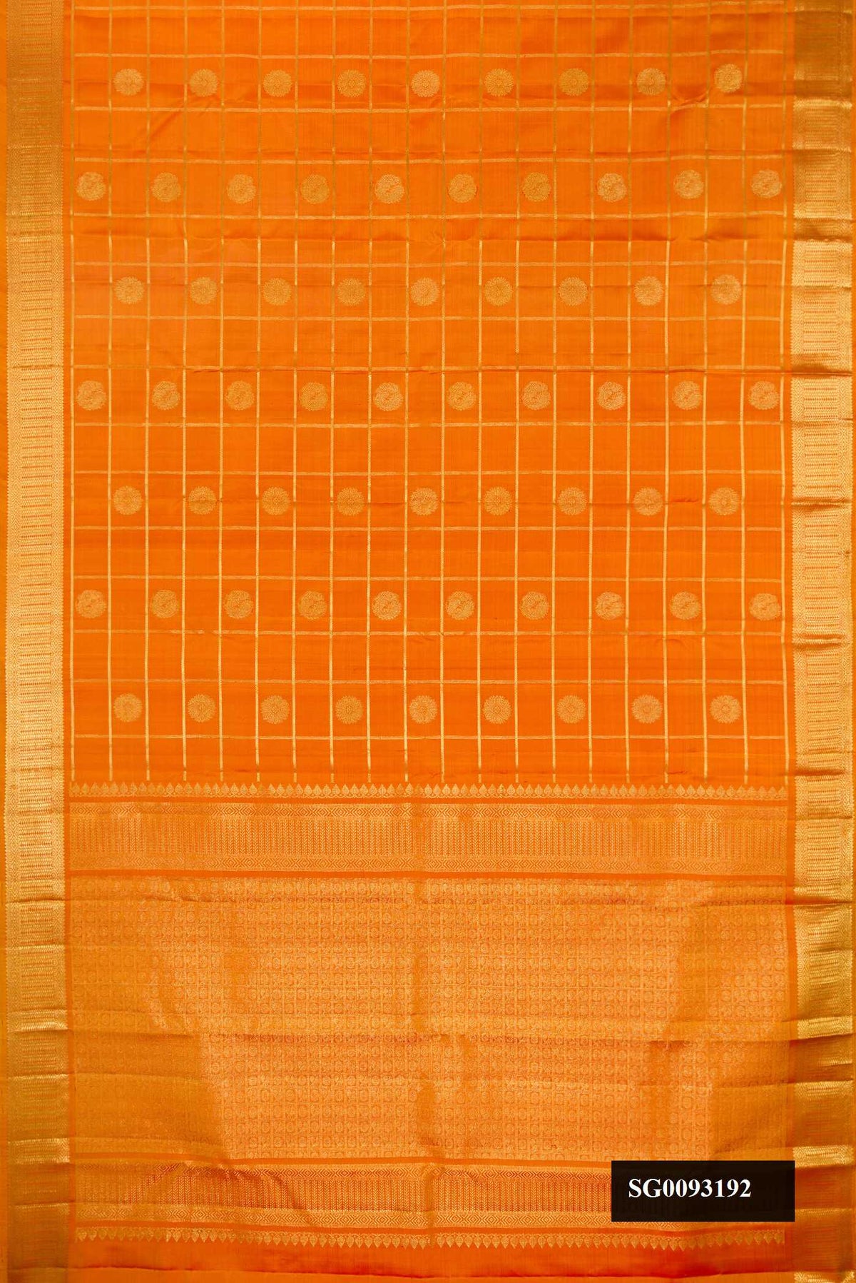 Mustard Dual Tone Kanchipuram Silk Saree with Checked design on the body and Zari Border.  displayed on a mannequin