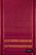 Maroon Dual Tone Kanchipuram Silk Saree with Checked design on the body and Zari Border.  displayed on a mannequin