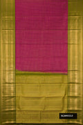 Burgundy Dual Tone Kanchipuram Silk Saree with Checked design on the body and Zari Border.  displayed on a mannequin