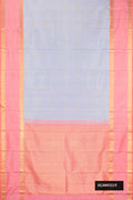 Lilac Dual Tone Kanchipuram Silk Saree with Zari Butta on the body and Zari Border.  displayed on a mannequin