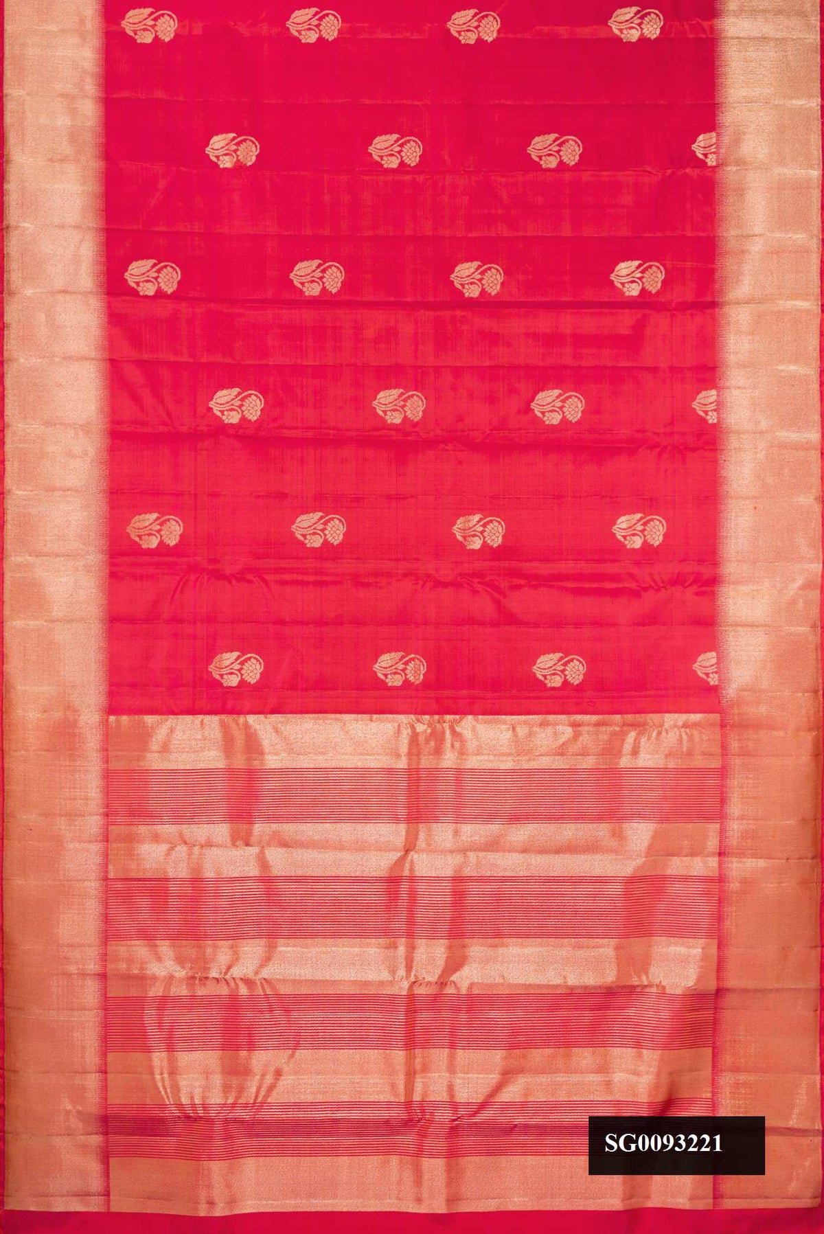 Coral Dual Tone Kanchipuram Silk Saree with Zari Butta on the body and Zari Border.  displayed on a mannequin