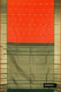 Orange Dual Tone Kanchipuram Silk Saree with Zari Butta on the body and Zari Border.  displayed on a mannequin