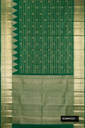 Bottle Green Dual Tone Kanchipuram Silk Saree with Stripes on the body and Zari Border.  displayed on a mannequin