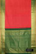 Red Dual Tone Kanchipuram Silk Saree with Checked design on the body and Zari Border.  displayed on a mannequin