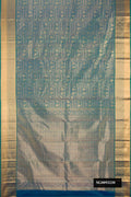 Peacock Blue Dual Tone Kanchipuram Silk Saree with Zari Brocade on the body and Zari Border.  displayed on a mannequin