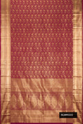 Maroon Dual Tone Kanchipuram Silk Saree with Zari Brocade on the body and Zari Border.  displayed on a mannequin