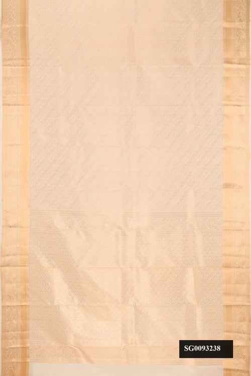 Beige Dual Tone Kanchipuram Silk Saree with Zari Brocade on the body and Zari Border.  displayed on a mannequin