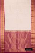 Off White Dual Tone Kanchipuram Silk Saree with Zari Brocade on the body and Zari Border.  displayed on a mannequin